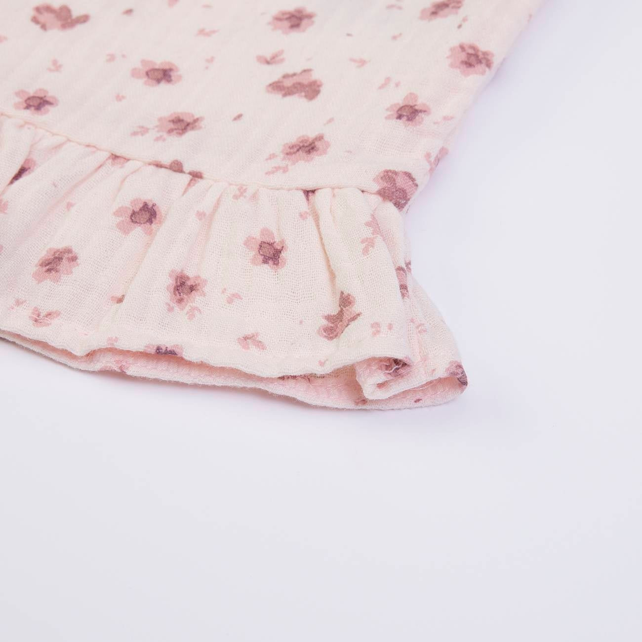Süßes Kleid in rosa aus Musselin-Stoff mit verstellbaren Trägern und niedlichen Schleifen
