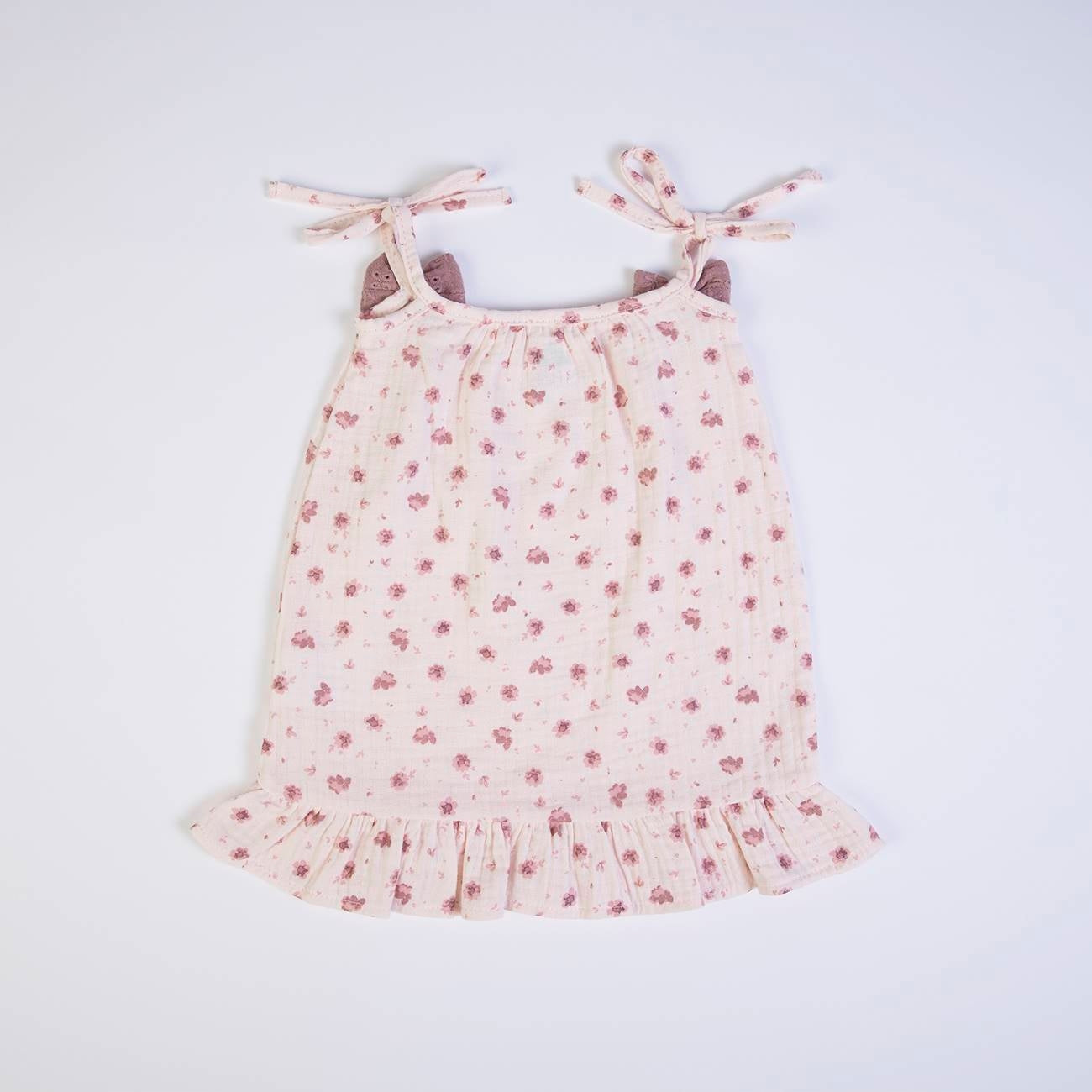 Süßes Kleid in rosa aus Musselin-Stoff mit verstellbaren Trägern und niedlichen Schleifen