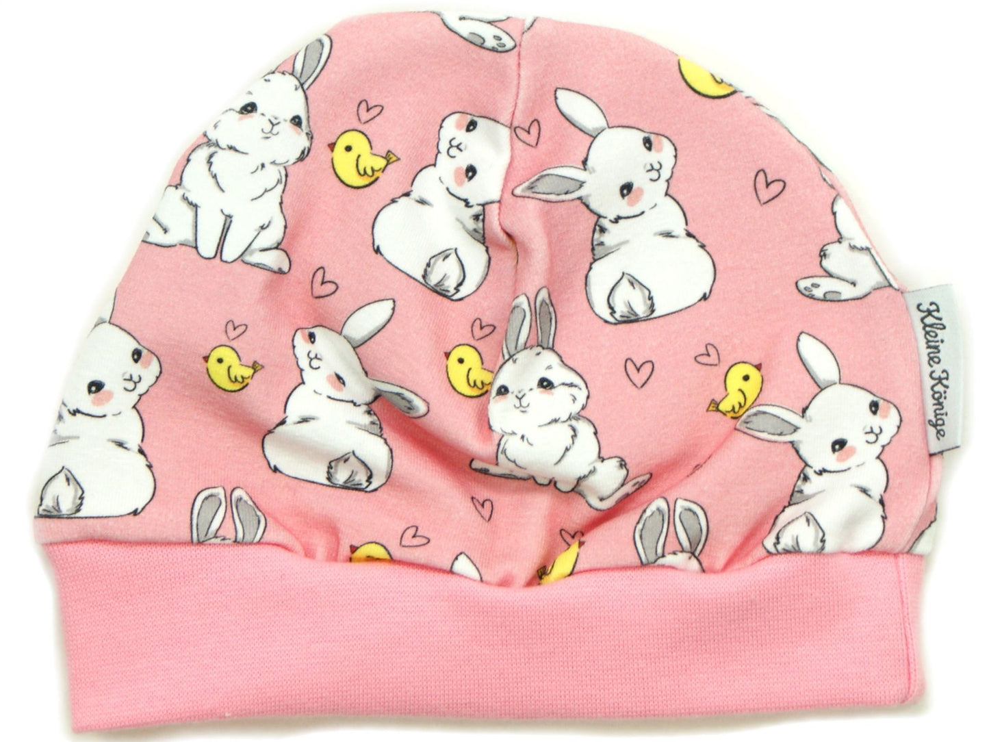 Süße Mütze in rosa mit Hasen und Vögeln und Herzen