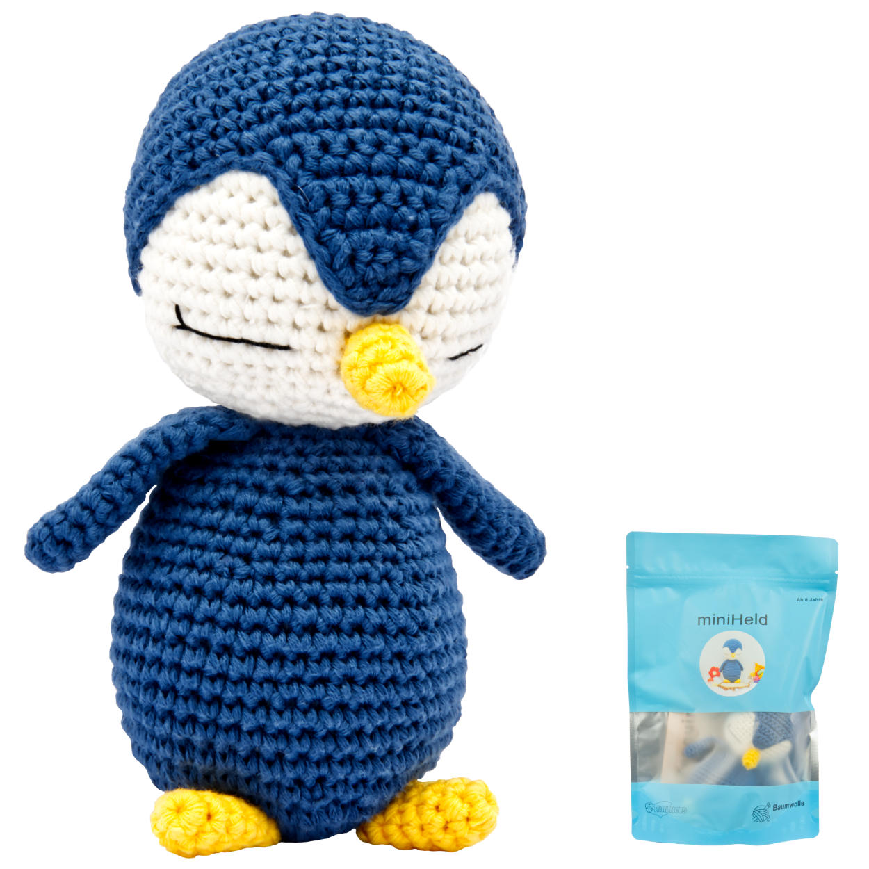 Der niedliche von Hand gehäkelte Pinguin wird deinem Kind ein treuer Begleiter sein
