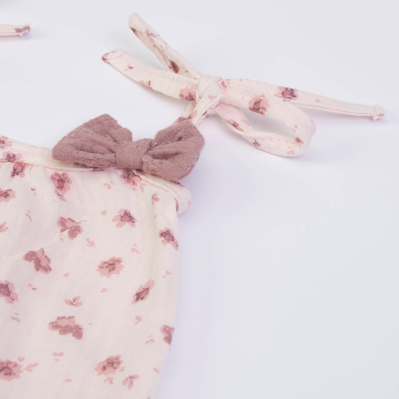 Süßes Kleid in rosa aus Musselin-Stoff mit verstellbaren Trägern und niedlichen Schleifen