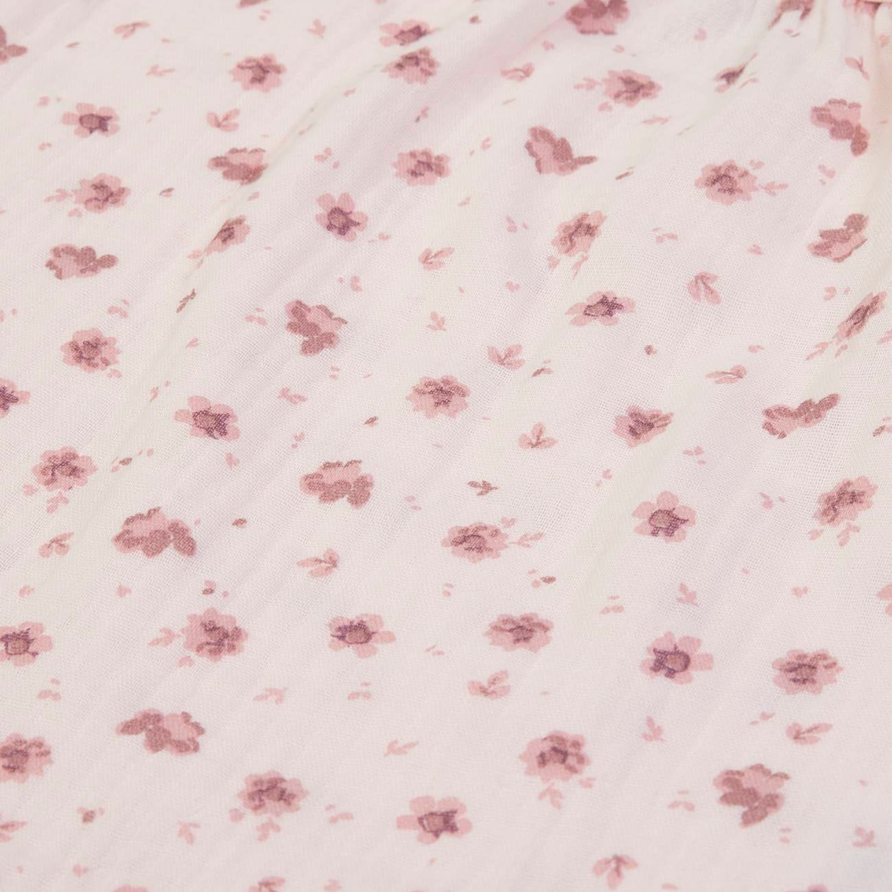 Süßes Kleid in rosa aus Musselin-Stoff mit verstellbaren Trägern und niedlichen Schleifen
