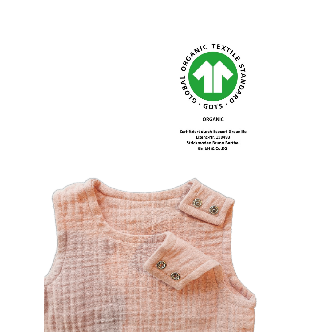 Schönes T-Shirt aus Musselin in zartem Rosa mit Druckknöpfen an der Schulter