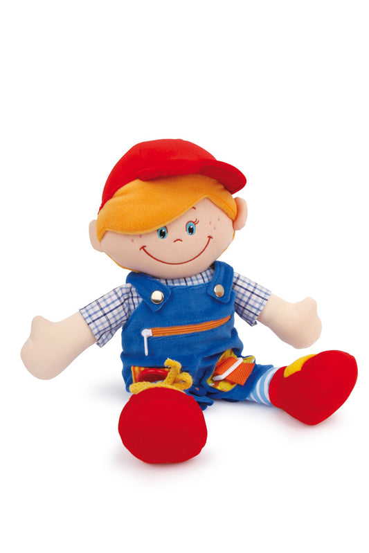 Lernpuppe Massimo mit blauer Latzhose und vielen Lern-Elementen