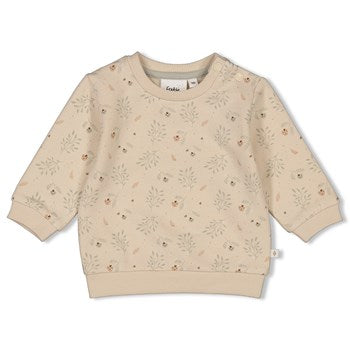 Süßer Sweater aus Bio-Baumwolle n Sand mit Blättern darauf