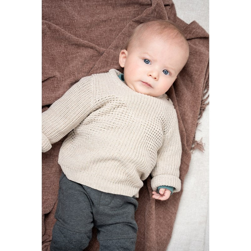 Schöner Strickpulli mit Muster und Rundhalsausschnitt
