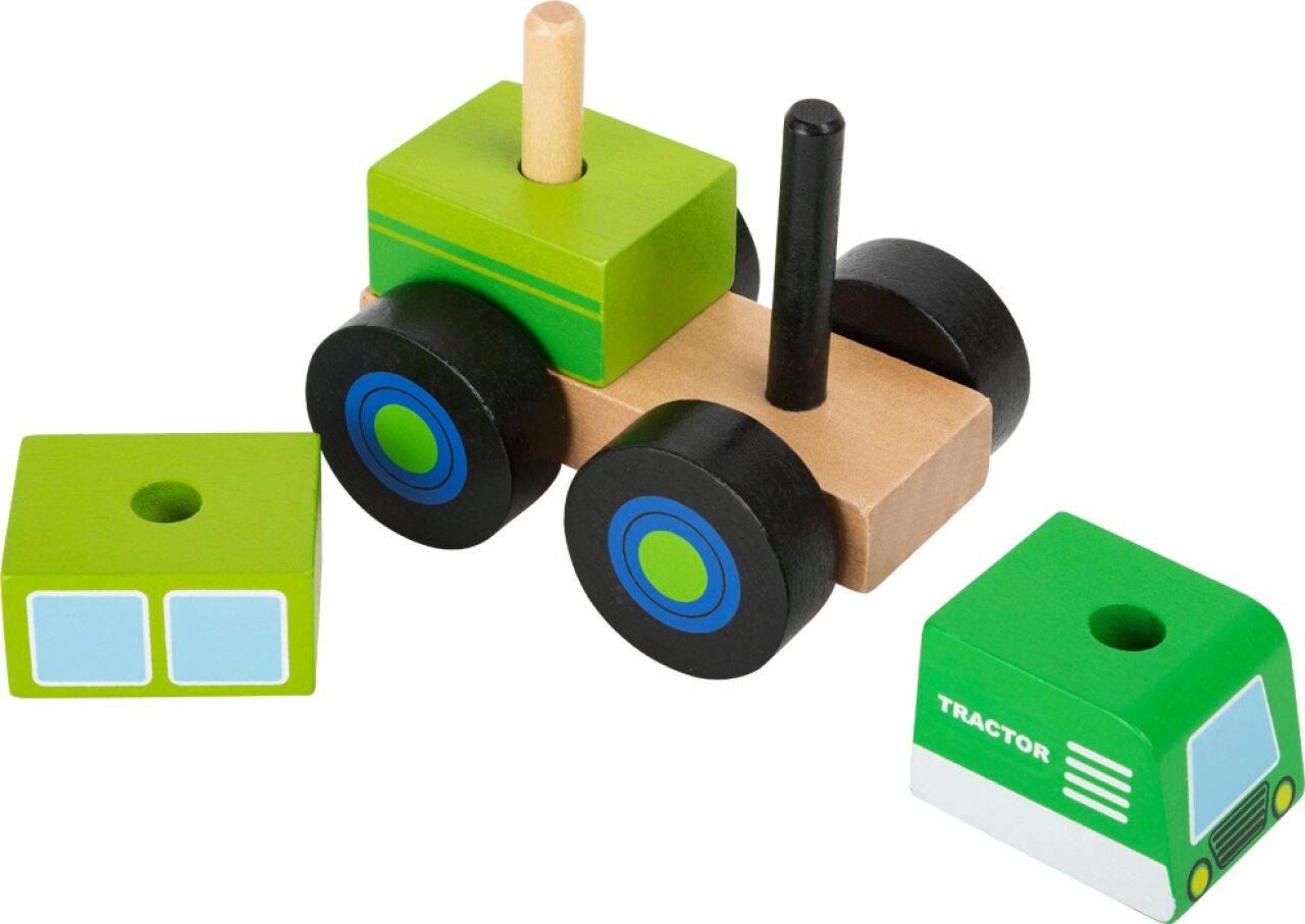 Grüner Spielzeugtraktor aus Holz zum zusammenstecken und fahren