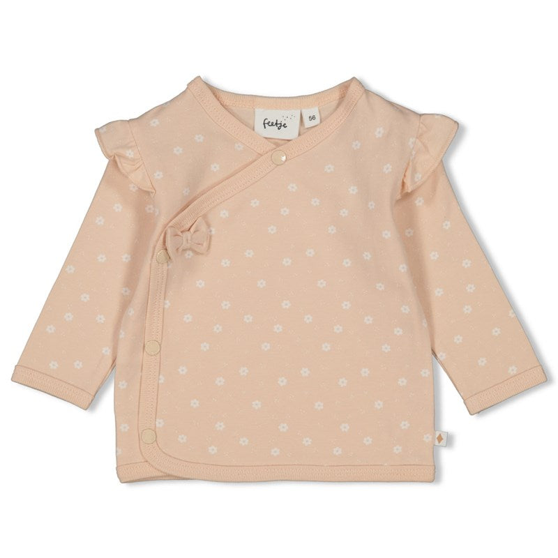 Niedliches Wickelshirt in rosa mit Rüschen und Schleife aus Bio-Baumwolle