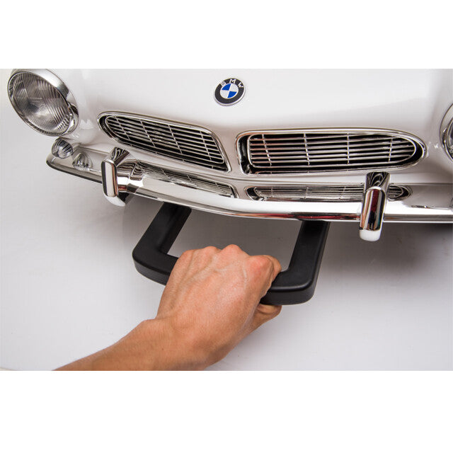 Wunderschöner BMW Oldtimer in weiß mit dem dein Kind stilvoll durch die Stadt fahren kann 