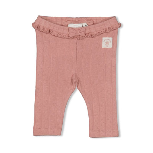Niedliche Legging in rosa mit zartem Lochmuster, Rüschen und Schleife