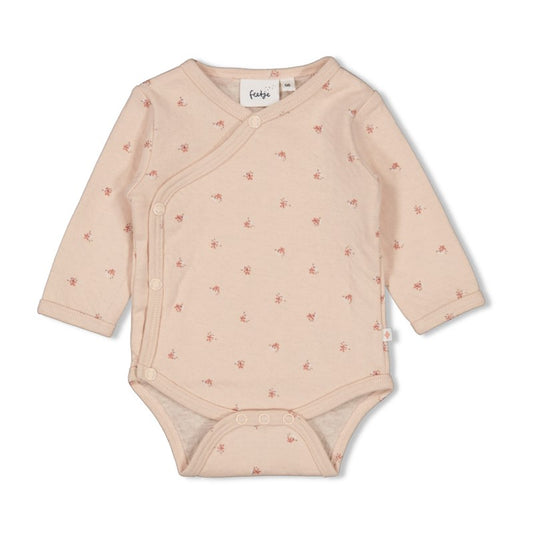 Schöner Wickelbody in hellem rosa mit Blumenmuster aus 100% Bio-Baumwolle 